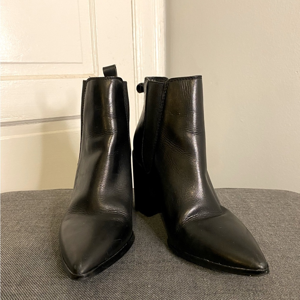 Steve Madden black leather boots.